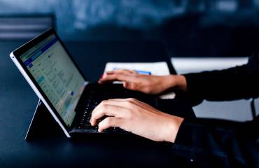 Rockfine-Business-Growth-Consultancy working on laptop